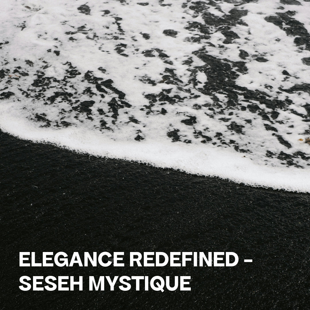 Abbildung von Wellen Schaum der auf Schwarzem Sandstrand ausläuft mit der Unterschtrift: "Elegance Redefined - Sheseh Mystique"